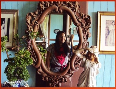 A selfie in a beautiful, old mirror