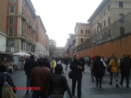 Joining the throng of people walking towards the Basilica
