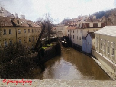 A smaller canal also under the bridge