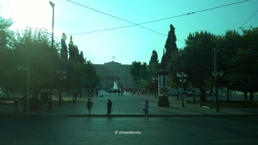 The Greek Parliament through the tainted glass of the bus window